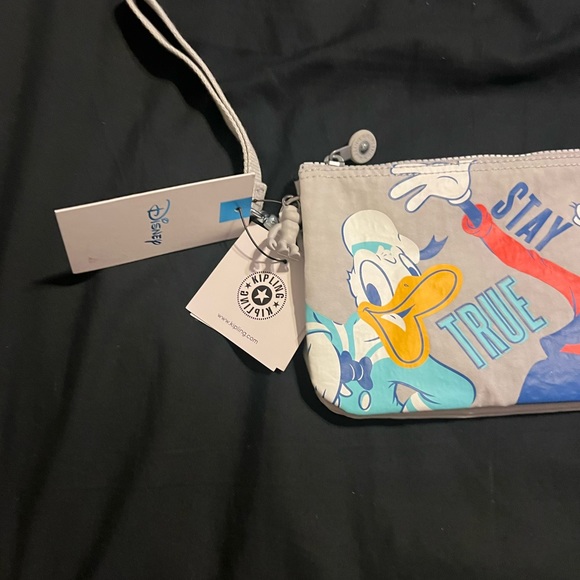 Kipling, Disney’s, Mickey and friends extra large wristlet go goofy NWT - Picture 4 of 5